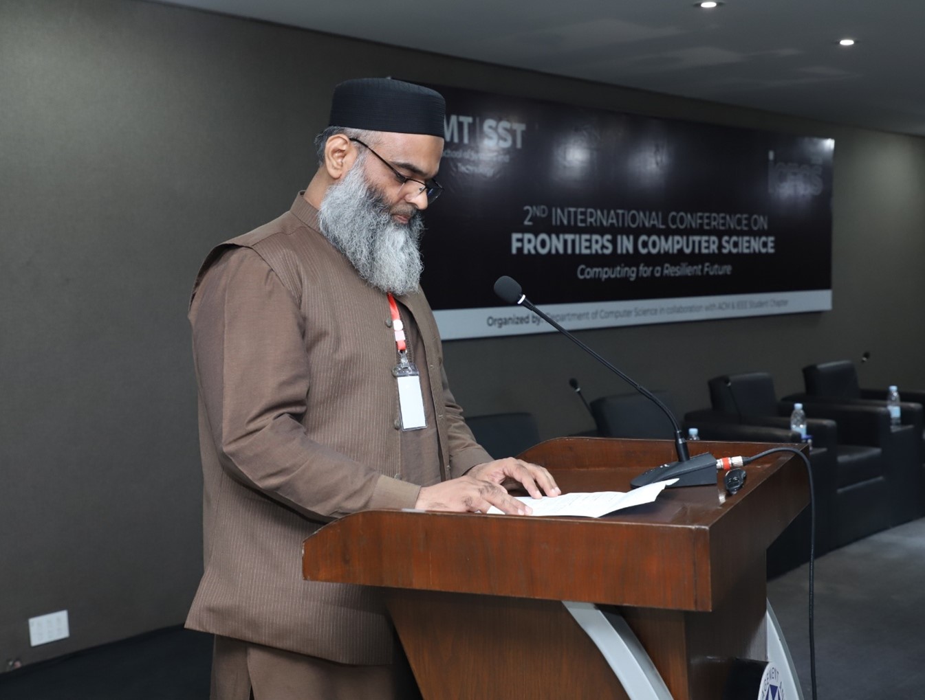 Dr. Malik Tahir Hassan
